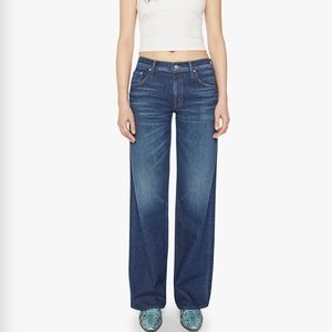 Slouchy, low-rise jeans with a loose wide leg, button fly and a long 34-inch ins